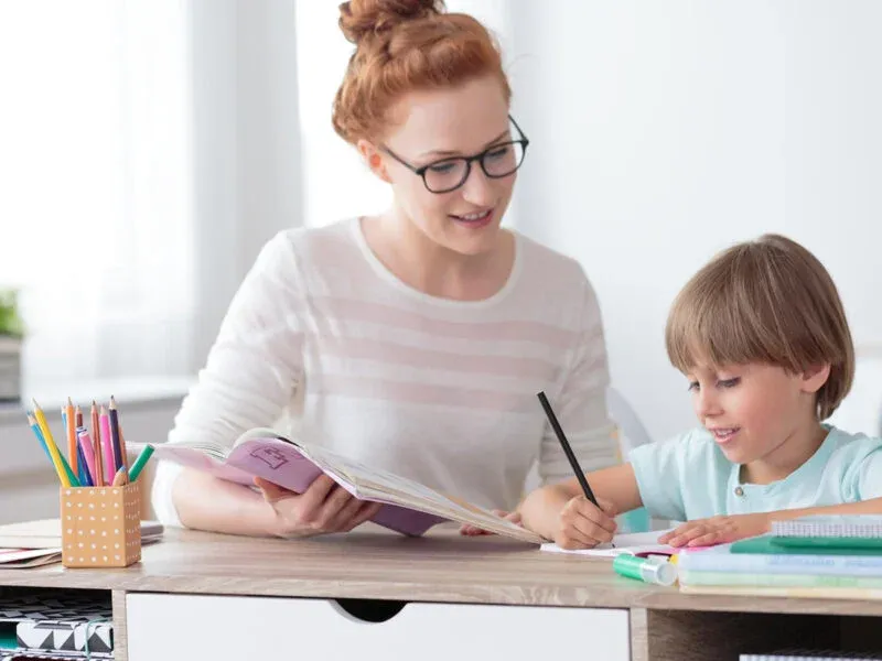 therapist teaching kid